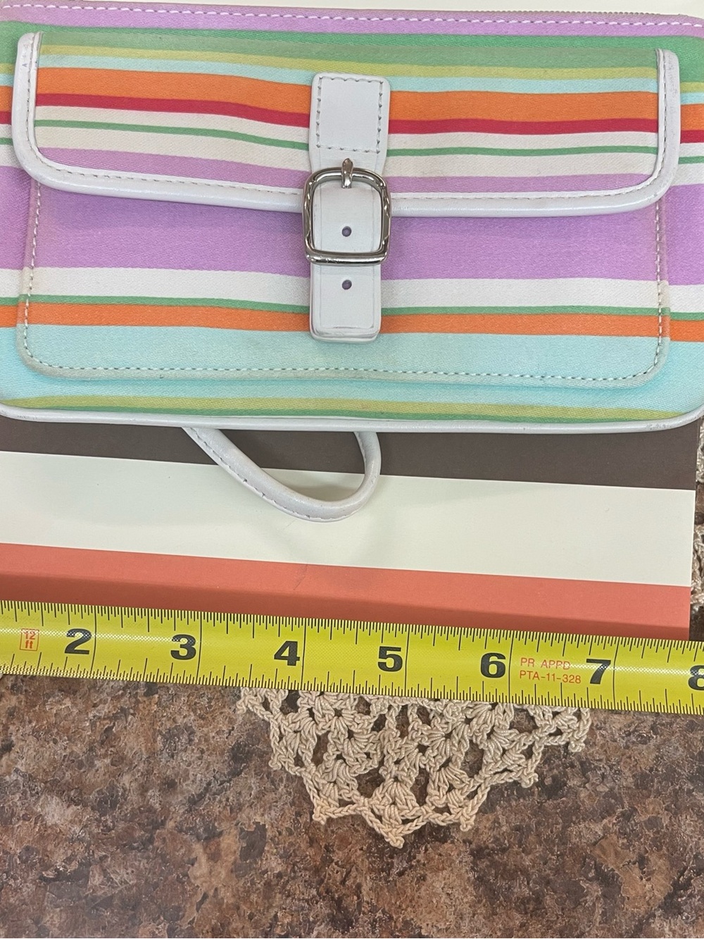 Coach Hampton striped wristlet with her Coach gift bag. - Picture 8 of 8